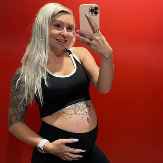 Pregnancy glow + this crop = danger