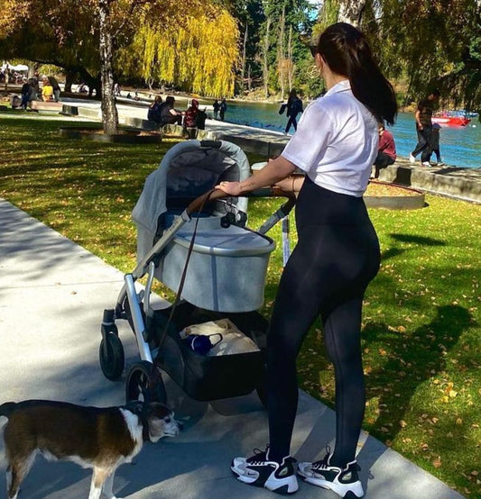 A collage showing a new mother in comfortable leggings and a t-shirt holding a baby, and a child proudly wearing a t-shirt with their own artwork printed on it.